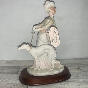 1984 Les Femmes Arnart Pucci Porcelain “Lady Walking Dog” figurine